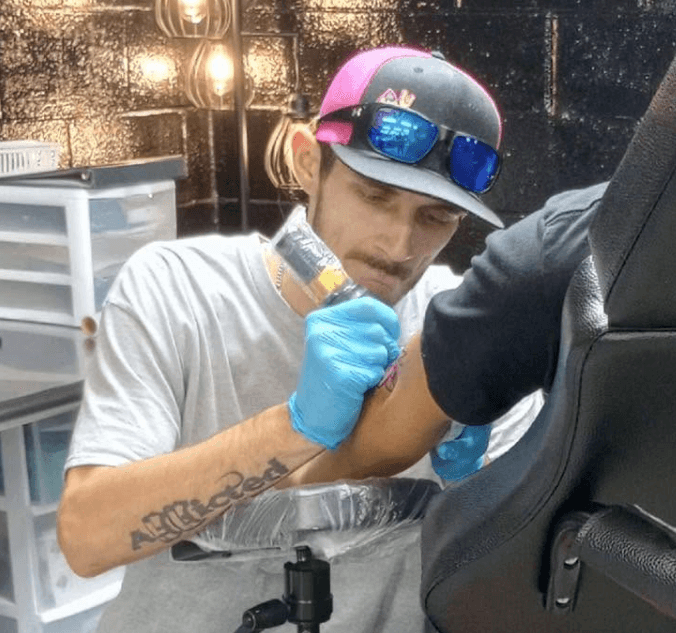 zach holland fayetteville nc tattoo artist